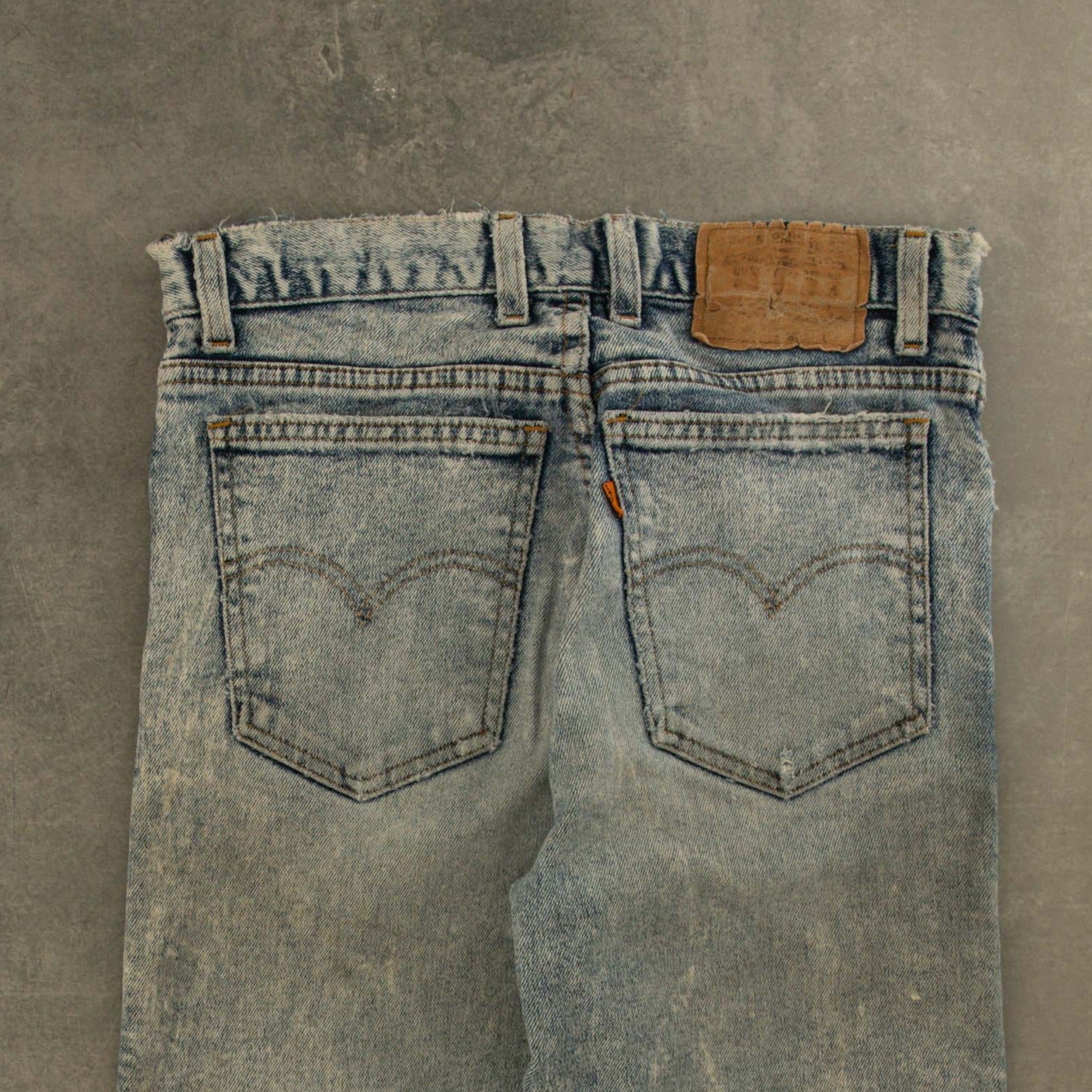 Orange distressed hot sale jeans