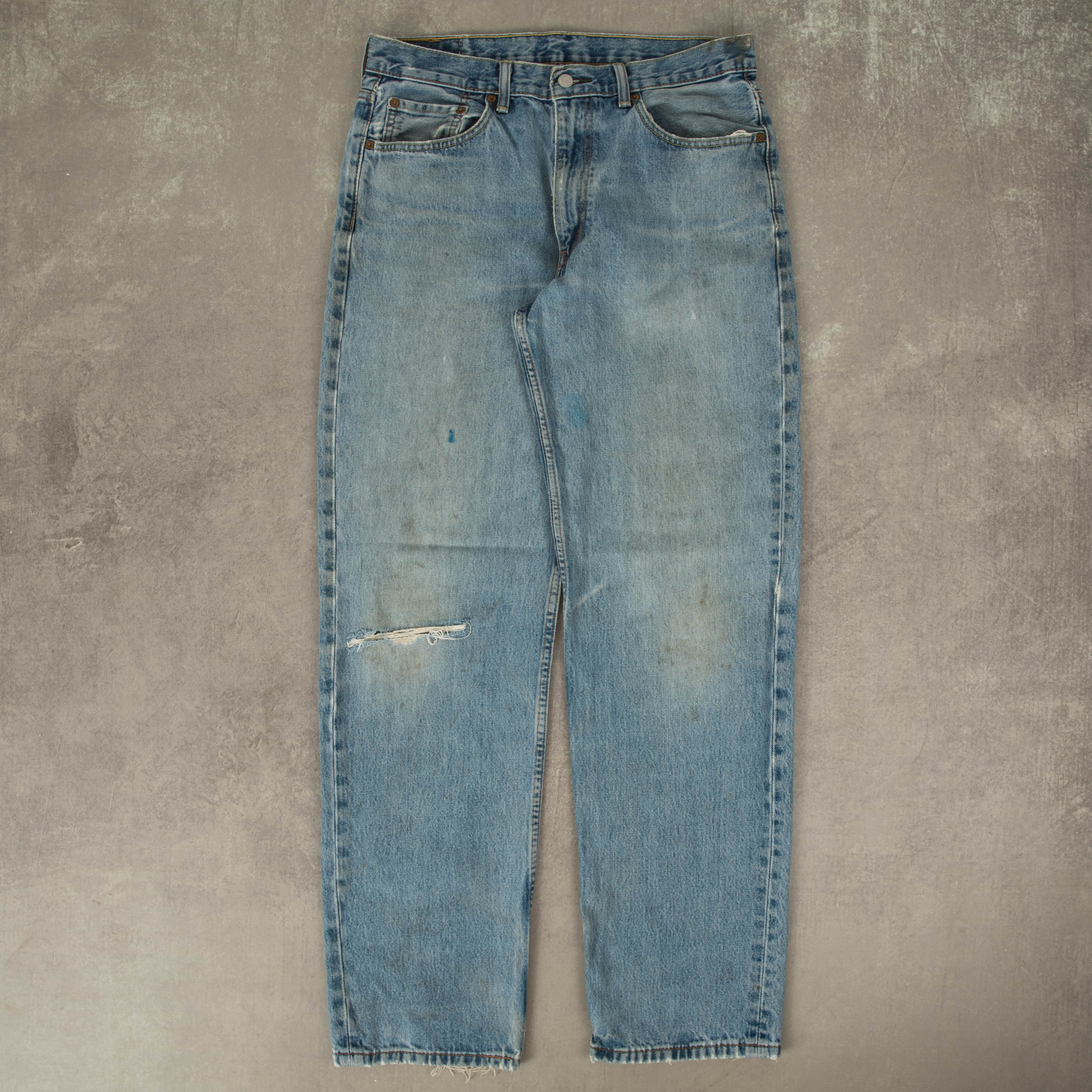 Distressed levis on sale